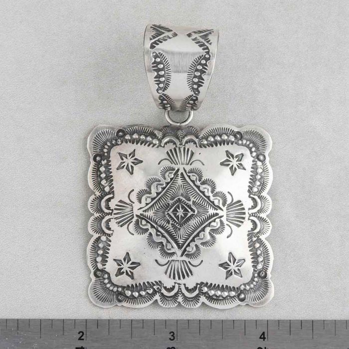 Navajo Handmade Sterling Silver Repoussé Pendant FJR2223